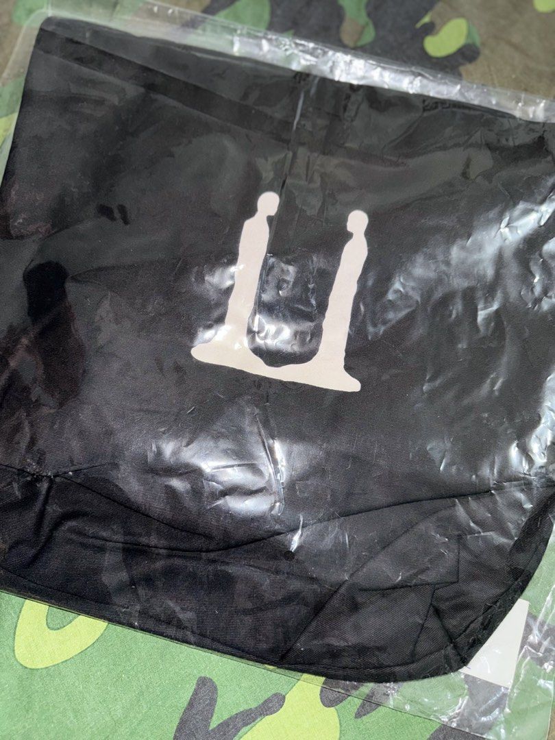 G-DRAGON UBERMENSCH Black Eco Bag (Category: Music Accessories) located in Manila. Submitted by trumanblack1975 (Listing ID 1468176951, Image 2). Description: - G-DRAGON UBERMENSCH (Made in Korea by Galaxy Corp & Copan Global) - Condition: Brand new, unopened, sealed in original plastic packaging with tag attached - Material: Black cotton - Size: 400 x 400 x 100 mm - Design: Large gothic logo on the front, graphic symbol on the back.