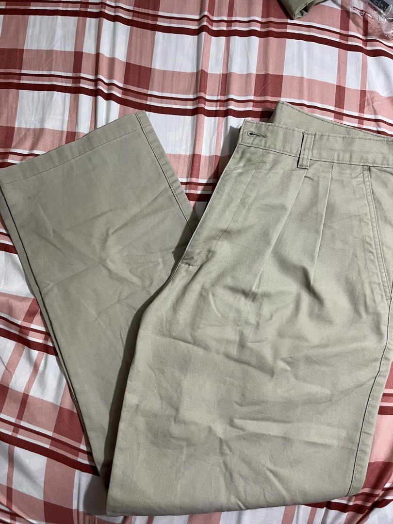 George Pleated Khaki Pants 34x32 (Category: Trousers) located in Pasay City. Submitted by Oboyyy (Listing ID 1468098108, Image 2). Description: - Brand: George - Color: Barley - Size: 34x32 - Material: 60% Cotton, 40% Polyester blend - Fit: Classic relaxed fit with belt loops, button closure, and zippered fly - Condition: Clean and ready to wear - Perfect for: Work or casual outings.