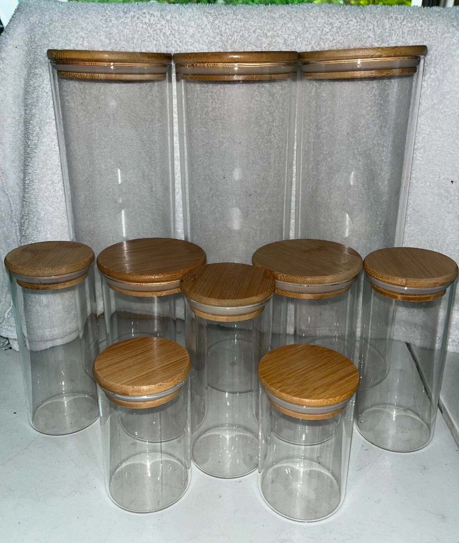 Glass Kitchen Storage Jars with Bamboo Lids Set (Category: Food Organization & Storage) located in Manila. Submitted by tricia_00 (Listing ID 1468081988, Image 1). Description: - Material: Clear glass with natural bamboo lids and airtight silicone seals - Organization: Variety of heights for versatile pantry storage - Ideal Use: Perfect for pasta, grains, coffee, snacks, and baking supplies - Design: Clean, minimalist look to elevate your kitchen