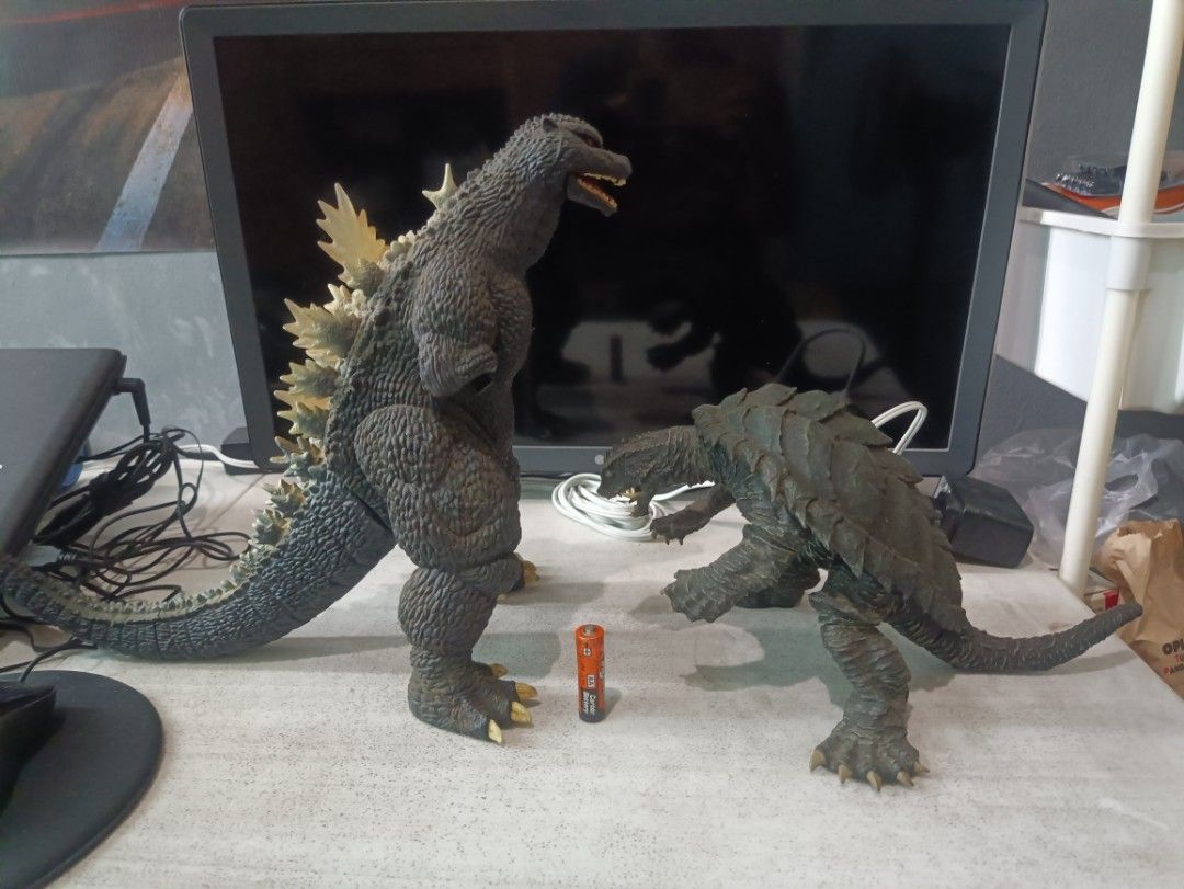 Godzilla and Gamera Figures Set (Category: Figurines & Statues) located in Makati City. Submitted by wyldrydr (Listing ID 1468086401, Image 1). Description: Selling as set of 2. Bandai 2004 Godzilla (missing arms and spikes, few paint chips, motor action untested) X-Plus Gamera 1999 (a bit loose limbs) Both figures are a bit dusty. .