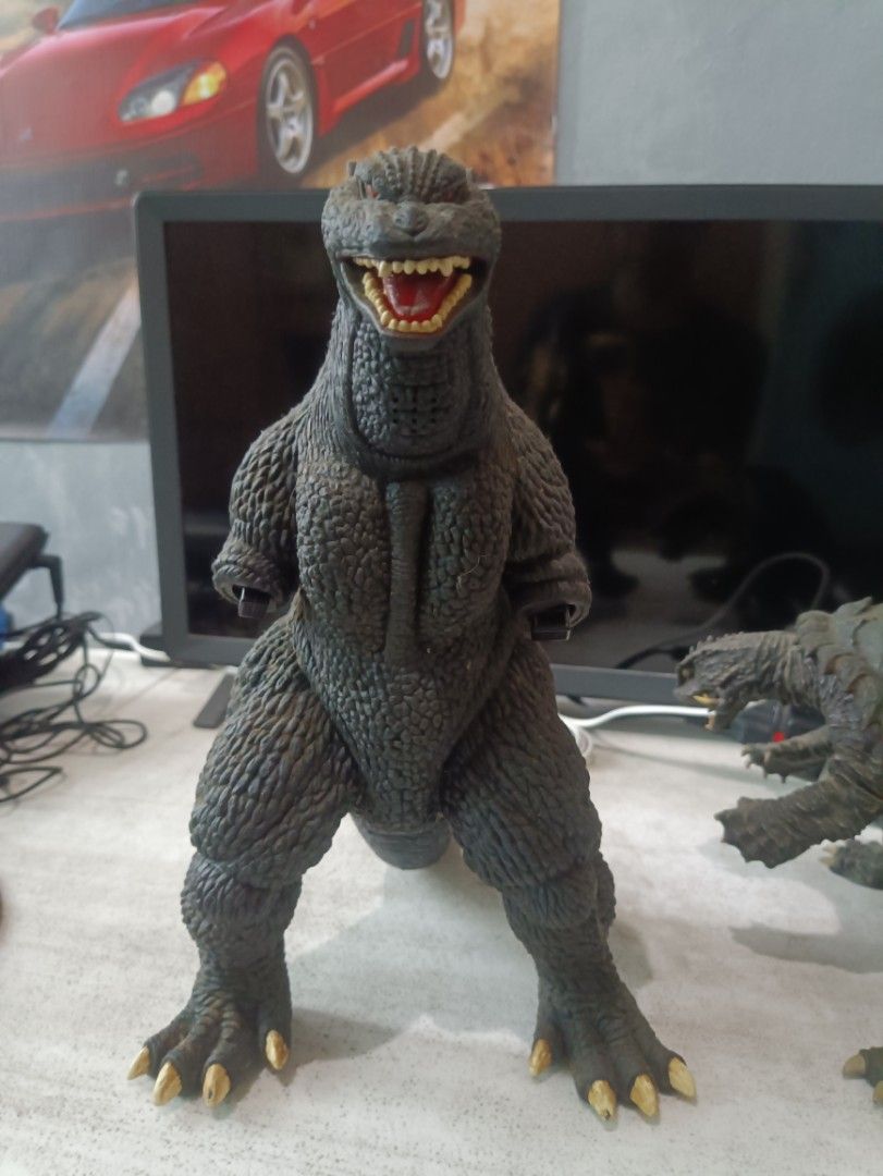 Godzilla and Gamera Figures Set (Category: Figurines & Statues) located in Makati City. Submitted by wyldrydr (Listing ID 1468086401, Image 2). Description: Selling as set of 2. Bandai 2004 Godzilla (missing arms and spikes, few paint chips, motor action untested) X-Plus Gamera 1999 (a bit loose limbs) Both figures are a bit dusty. .