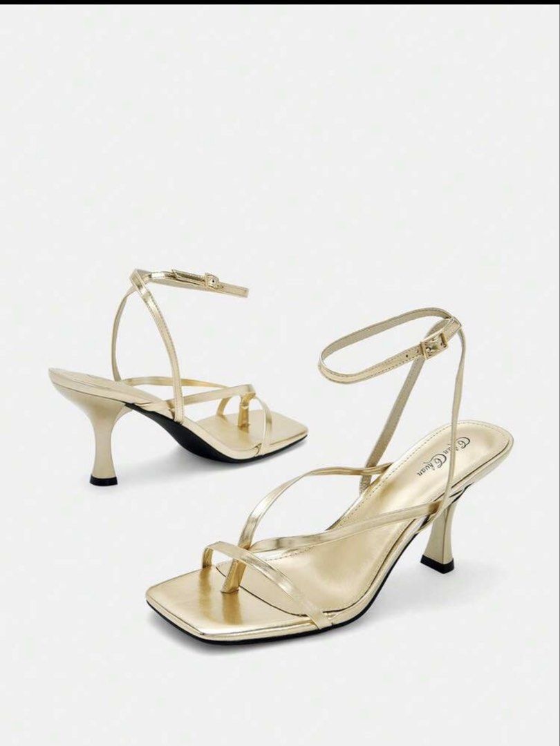 Gold Square Toe Strappy Kitten Heels Size 7 (Category: Heels) located in Manila. Submitted by andreaaarut2 (Listing ID 1468084113, Image 1). Description: only used 2 times :) RFS: not my size Original Price: ₱700 - Color & Style: Gold strappy heels with a chic square toe and kitten heel - Size: US 7 - Closure: Adjustable ankle strap with buckle - Condition: Uppers are in solid shape; minor wear on the soles from previous use - Perfect for: Partie