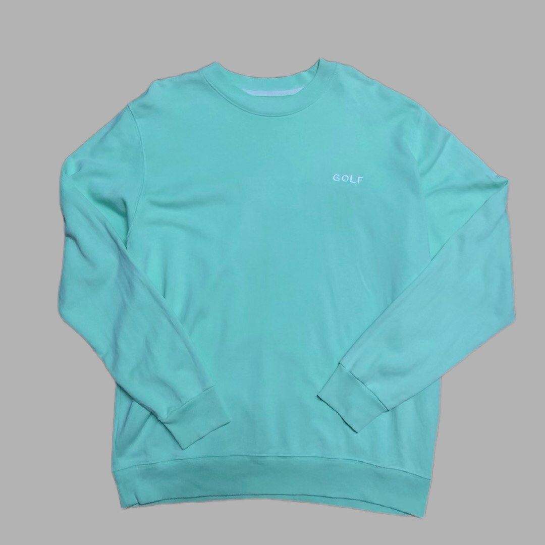 GOLF Wang Mint Green Embroidered Logo Sweatshirt Medium (Category: Coats, Jackets and Outerwear) located in Dasmarinas. Submitted by johnlloydm99208 (Listing ID 1468260285, Image 1). Description: - Brand: GOLF - Color: Mint green - Size: Medium - Material: 100% cotton (Made in Peru) - Design: Small white embroidered chest logo, classic ribbed cuffs, collar, and hem - Details: Features the iconic yellow GOLF inside tag - Condition: Clean, comforta