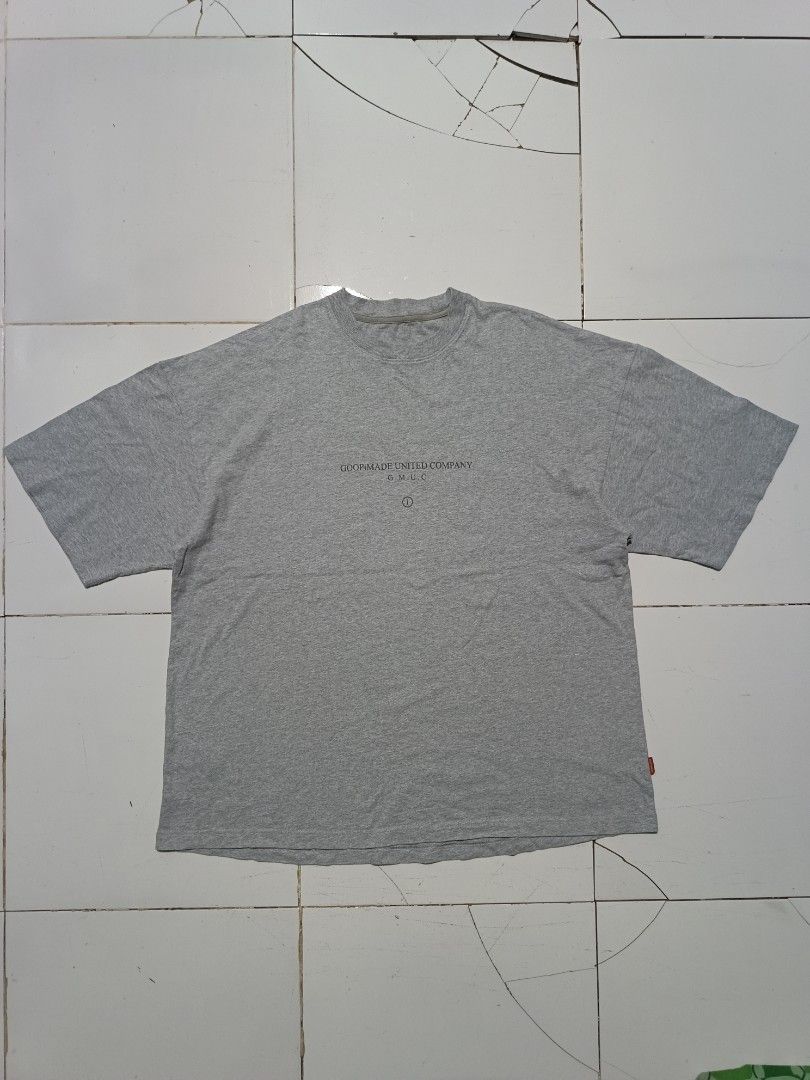 GOOPiMADE Grey Graphic Tee (Category: Tshirts & Polo Shirts ) located in Barotac Nuevo. Submitted by gray101 (Listing ID 1468208983, Image 2). Description: - Brand: GOOPiMADE - Color: Grey - Fit: Relaxed fit for daily comfort - Material: Premium soft cotton fabric with a clean neckline - Details: Small GMUC text print on chest - Back Design: Large schematic logo with concept laboratory text - Accent: Signature red branded tag on the lower hem - P
