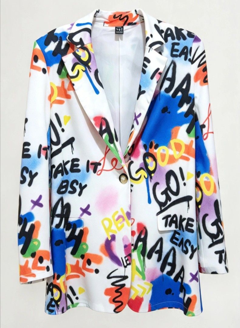 Graffiti Print Casual Blazer Jacket (Category: Coats, Jackets and Outerwear) located in Manila. Submitted by peptaura (Listing ID 1468187442, Image 1). Description: White blazer covered in bold multicolored graffiti graphics and typography. Single-button front closure with notched lapels and front flap pockets. Lined interior. Lightweight fabric with an artsy, statement streetwear vibe. Eye-catching piece for layering over simple outfits..