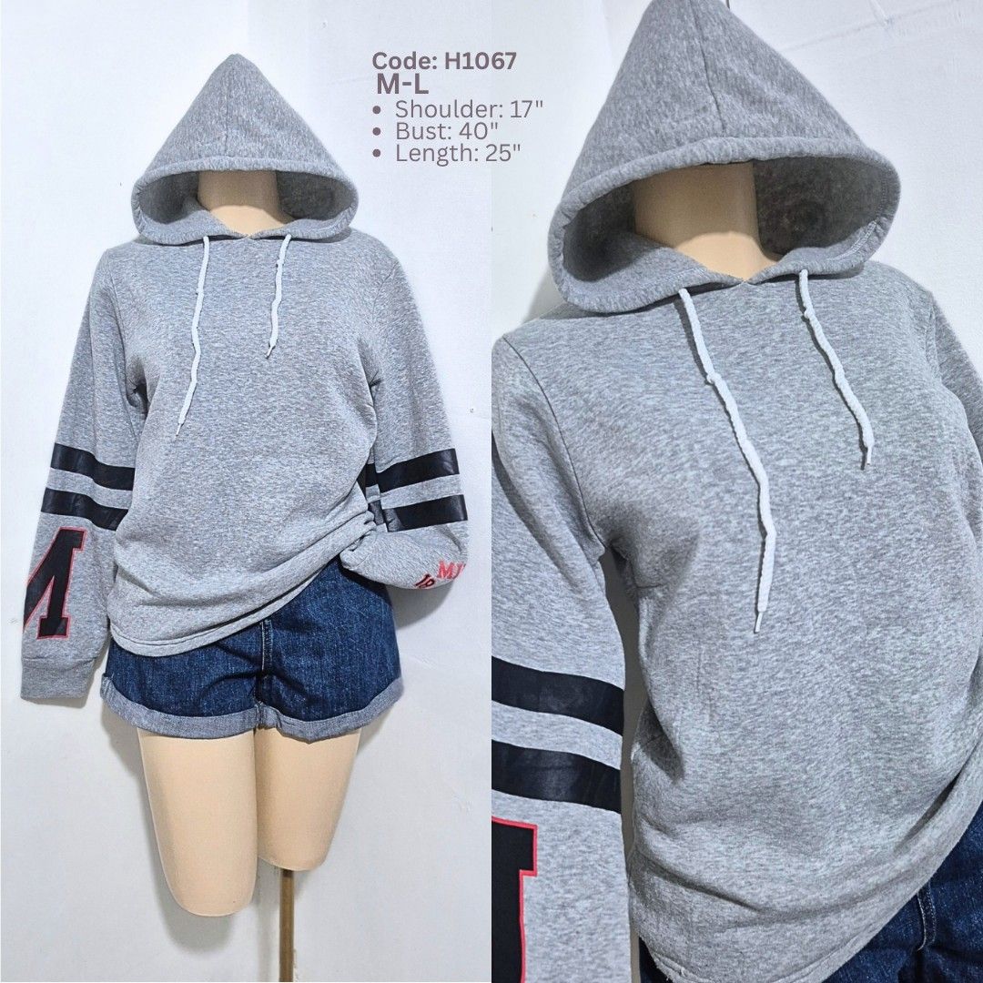 Gray Varsity Letter Hoodie | M-L | Comfy Casual Pullover (Category: Hoodies) located in Cabanatuan. Submitted by _erboutique (Listing ID 1468255586, Image 1). Description: • Heather gray pullover hoodie — varsity style sleeve stripes & letter detail • Soft fleece fabric, adjustable white drawstring hood • Relaxed fit — perfect for everyday wear • Size: M–L | Shoulder: 17" | Bust: 40" | Length: 25" • Code: H1067 • Great preloved condition.
