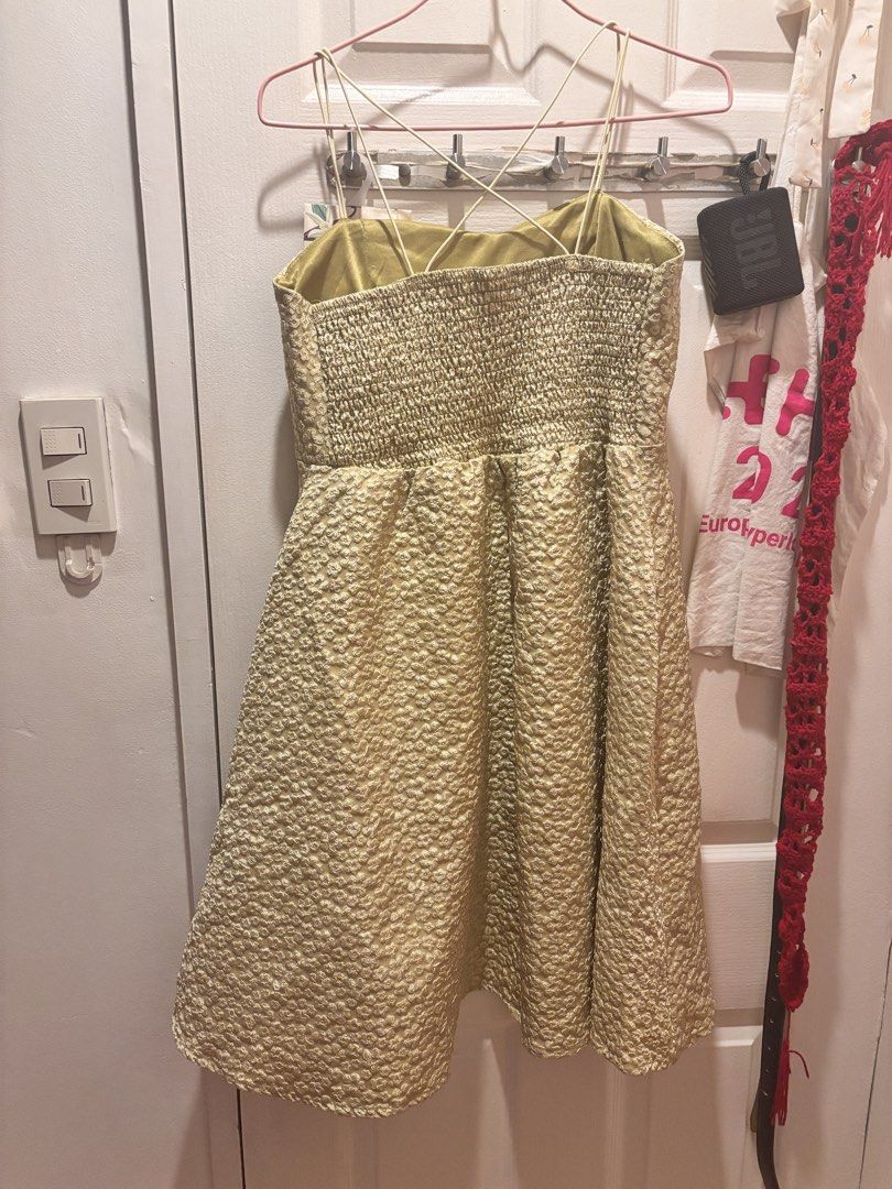 Green flare dress with spaghetti straps (Category: Dresses) located in Valenzuela. Submitted by sasha2802 (Listing ID 1468196691, Image 2). Description: - green with textured floral pattern throughout - Sweetheart neckline, flared skirt, knee length - Thin crisscross straps and ruched back - clean and worn only once - declutterring wardrobe sale.