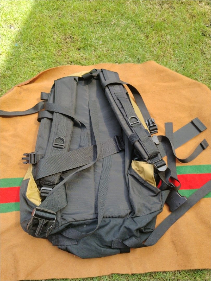 Gregory bagpack (Category: Backpacks) located in Legazpi City. Submitted by genobecollectives (Listing ID 1468079672, Image 2). Description: - Authentic vintage Gregory backpack made in USA - Stylish tan and black colorway with classic woven brand patch - Durable 60/40 cotton-nylon blend construction - Padded shoulder straps for all-day comfort - Multiple exterior compression straps and heavy-duty hardware 18 x 23 33 liters 2,000 add sf.