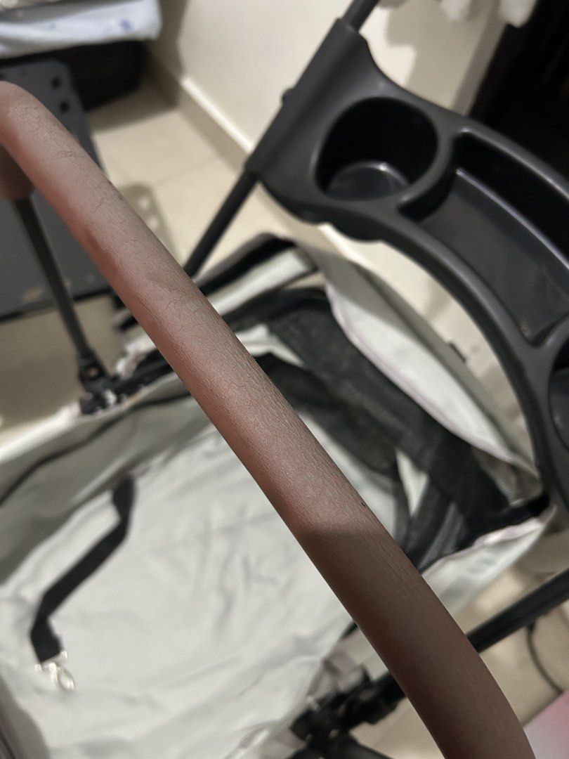 Grey Foldable Pet Stroller with Cup Holder and Storage (Category: Strollers) located in Mandaluyong City. Submitted by ncooooooo (Listing ID 1468224261, Image 3). Description: RFS: Changed to a bigger cart. Naka tambak lang but no issues aside from the foam cracks on the carrier bar due to sun exposure. Minimal wear, visible on the wheels. Already washed the liner. - Color: Grey - Condition: Good working condition, minor surface cracking and wear