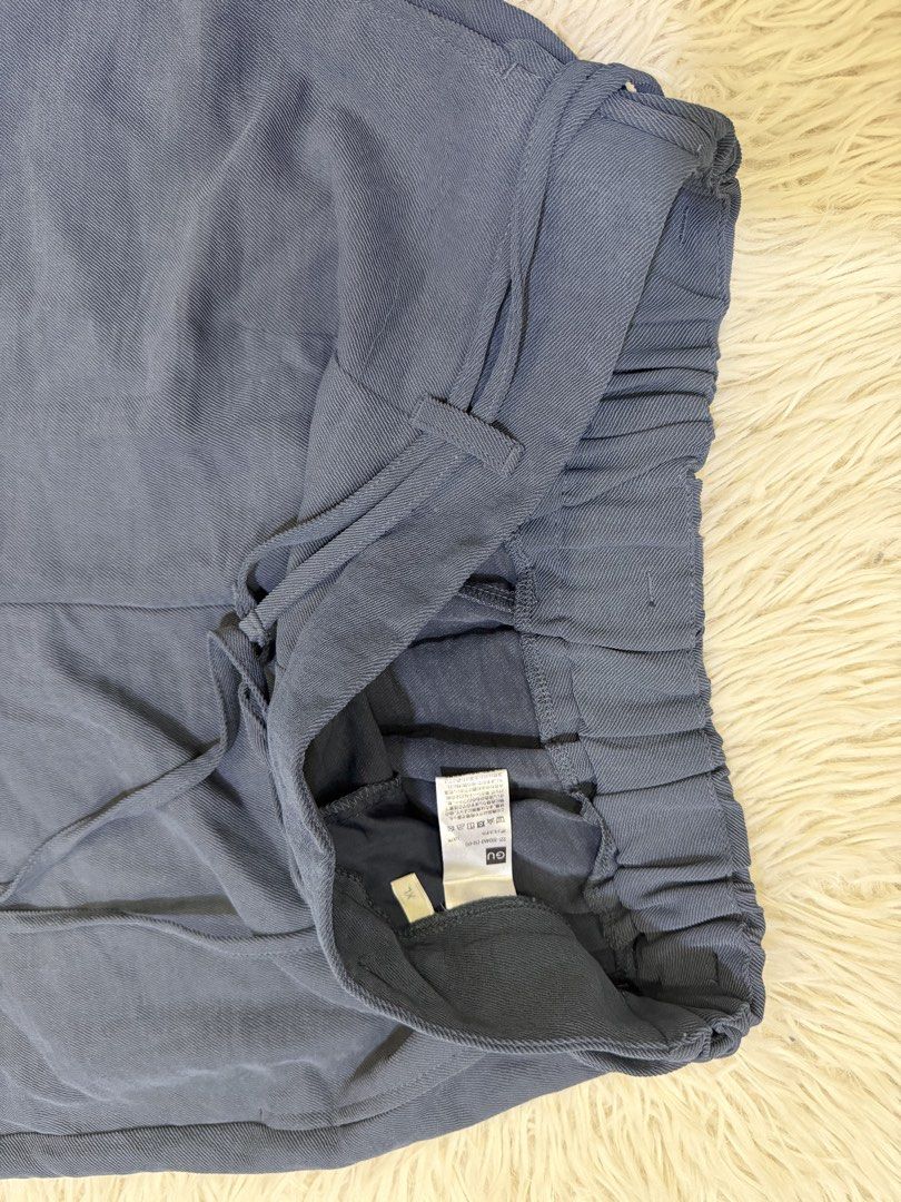 GU Blue Wide Leg Pants Size XL (Category: Jeans) located in Manila. Submitted by kristinata44809 (Listing ID 1468207254, Image 3). Description: - Brand: GU - Style: High-waisted wide leg pants with matching fabric belt - Color: Muted blue - Size: XL (elastic back waistband for extra comfort) - Material: Lightweight textured fabric - Condition: Clean, well-maintained, and ready to wear.