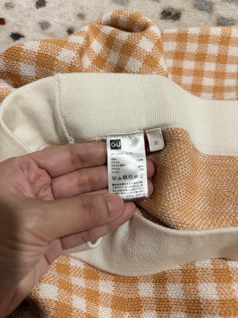 GU Gingham Knit Midi Skirt Yellow Size M (Category: Skirts) located in Mandaluyong City. Submitted by riz_040521 (Listing ID 1468073097, Image 3). Description: - Brand: GU - Style: Knitted midi skirt in a yellow and white gingham pattern - Size: M (tag attached) - Material: Comfortable acrylic knit fabric - Features: Easy pull-on style with an elasticated white waistband -70 cm to 72 cm -BOUGHT IN JAPAN 🇯🇵 .