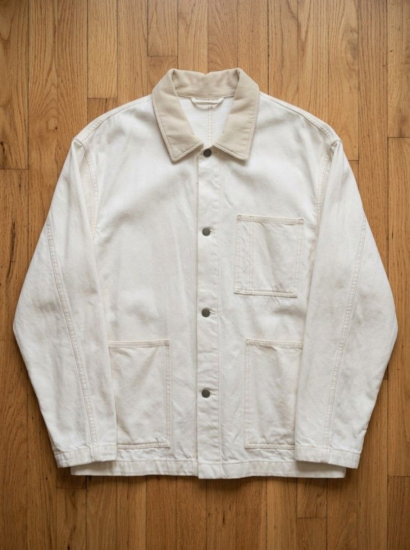 GU Off-white canvas work jacket (Category: Coats, Jackets and Outerwear) located in Quezon City. Submitted by lancelooot (Listing ID 1468149472, Image 1). Description: - Color: Off-white canvas with contrasting beige corduroy collar - Closure: Snap button front - Pockets: One chest pocket and two lower patch pockets - Fit: Regular fit, great for layering over hoodies and sweaters - Material: Heavy-duty cotton fabric with clean stitching throughou
