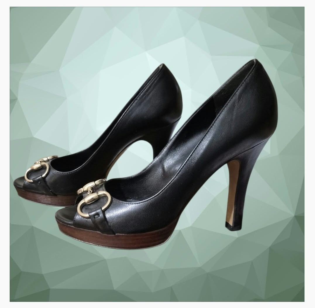 Gucci Black Leather Horsebit Peep Toe Platform Pumps (Category: Heels) located in Paranaque City. Submitted by calm_youngstore7 (Listing ID 1468242873, Image 1). Description: RUSH SALE! - Brand: Gucci - Style: Peep-toe heels / Slip-on - Color: Classic black with gold-tone hardware - Material: Premium leather upper and branded insole, dark wood platform and stiletto heel - Details: Signature horsebit hardware across the toe - Condition: Excellent 