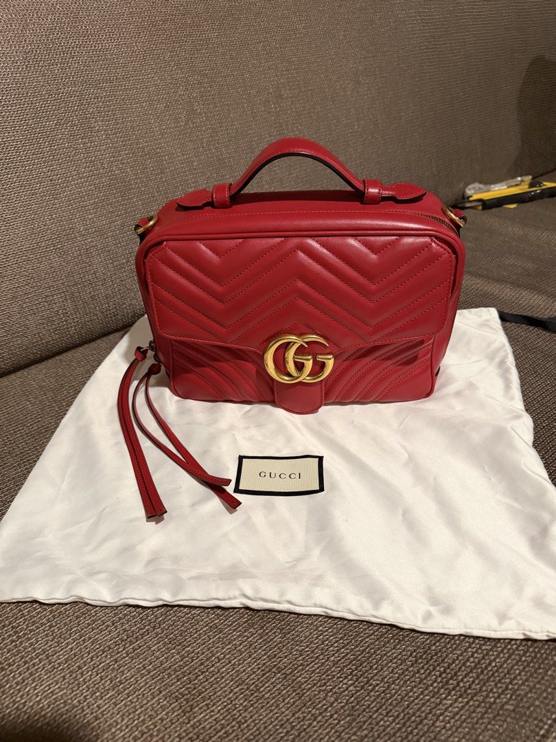 Gucci Marmont Red Leather Top Handle Bag (Category: Luxury Bags & Wallets) located in General Santos City (Dadiangas). Submitted by mereyelle (Listing ID 1468173660, Image 1). Description: - Authentic Gucci Marmont Top Handle Bag in stunning red chevron leather - Features antique gold-tone hardware and the iconic interlocking GG logo - Clean light beige microfiber interior with a convenient zip pocket - Includes a structured top handle and an int