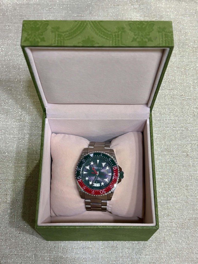 GUCCI WATCH Men’s ORIGINAL (Category: Men's Watches) located in Quezon City. Submitted by dazzlejeweller (Listing ID 1468075994, Image 2). Description: Gucci Dive Green Dial 45mm Stainless Steel Men’s Watch ₱70,000 Comes with the box.