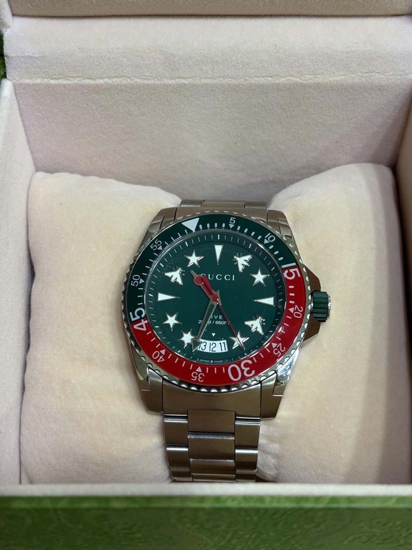 GUCCI WATCH Men’s ORIGINAL (Category: Men's Watches) located in Quezon City. Submitted by dazzlejeweller (Listing ID 1468075994, Image 1). Description: Gucci Dive Green Dial 45mm Stainless Steel Men’s Watch ₱70,000 Comes with the box.