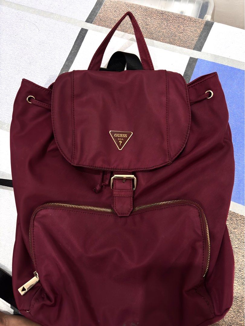 Guess Burgundy Nylon Backpack (Category: Backpacks) located in Manila. Submitted by niellaeun (Listing ID 1468263436, Image 1). Description: Original Guess Bag RFS: Decluttering .
