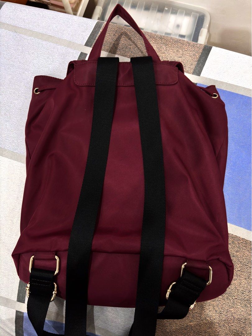 Guess Burgundy Nylon Backpack (Category: Backpacks) located in Manila. Submitted by niellaeun (Listing ID 1468263436, Image 2). Description: Original Guess Bag RFS: Decluttering .