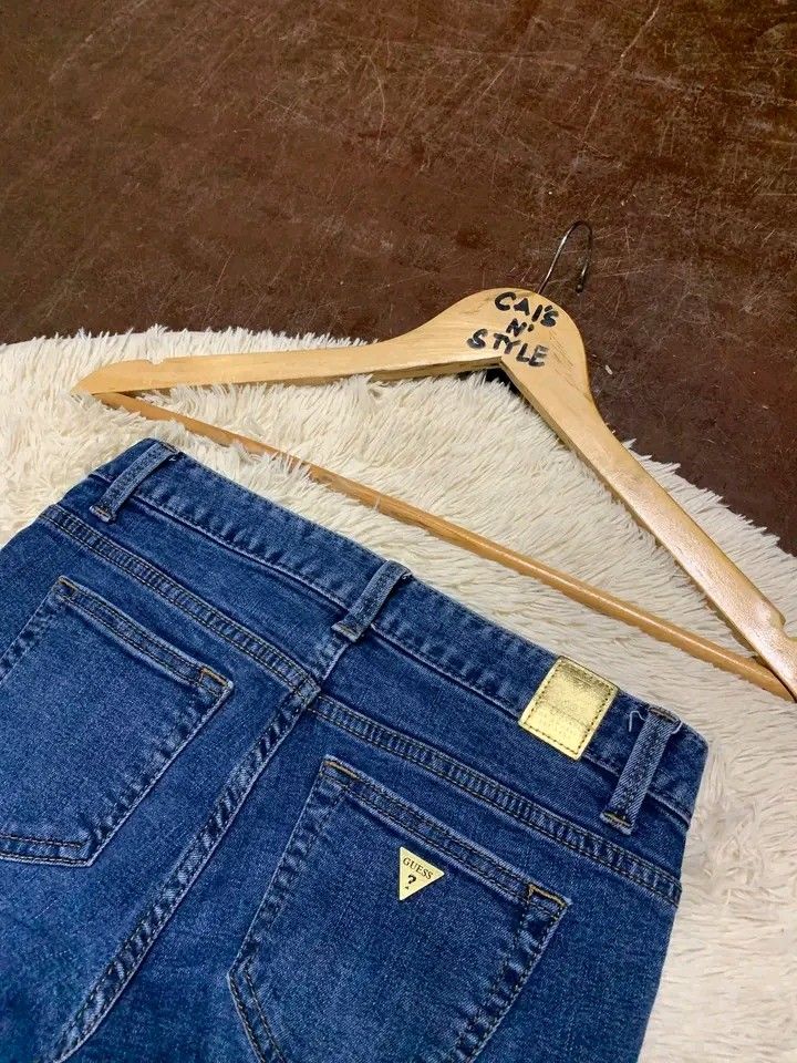 Guess flare jeans (Category: Jeans) located in Lianga. Submitted by legitseller12345678 (Listing ID 1468226782, Image 2). Description: Guess flared jeans for women📌 Like new 10/10 Color rate Waistline 25-27 Length 35 Hem 7.5 Stretchable Solid nito💯 Mine 500 plus sf Payment first Unli vouch/Vc with items for safety Mop: Gcash Courier: J&T Mine or Dm to purchase📩.