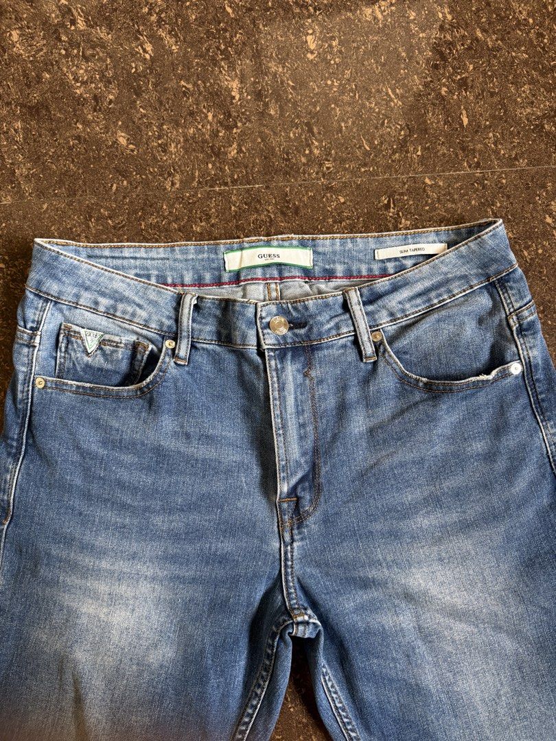 Guess Slim Tapered (Category: Jeans) located in Legazpi City. Submitted by dauthenticlooters (Listing ID 1468190289, Image 3). Description: PRE-LOVED, NOT THRIFT! ❗️ ✨ Pristine condition 🤍 No issues, well taken care of 🛍️ Authentic in-store purchases.