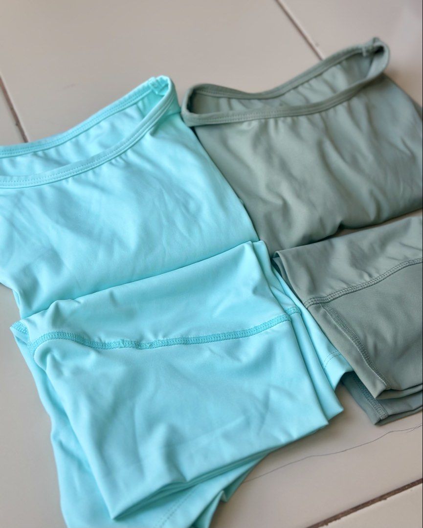 Gym fitted terno (Category: Activewear) located in Makati City. Submitted by popmart (Listing ID 1468082868, Image 2). Description: P 500/each or P 800/both Cyan and Green Size L - Best fits M-L Stretchable.