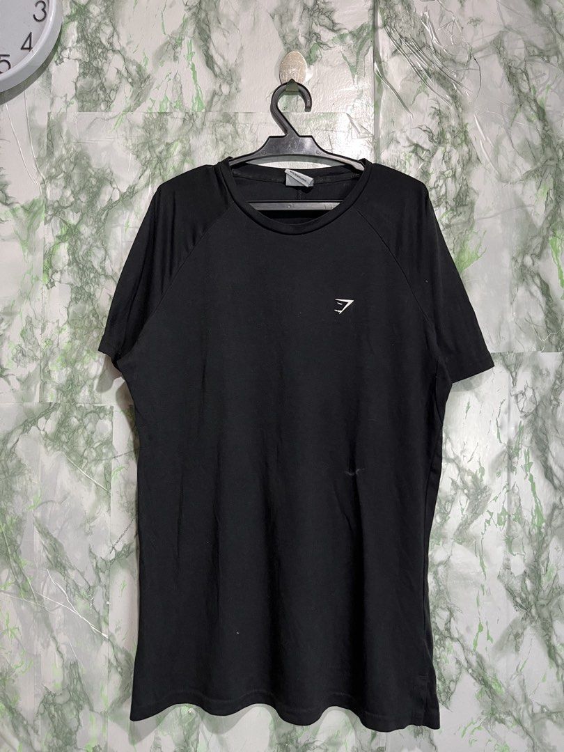 GYMSHARK T-shirt (Category: Activewear) located in Bulacan. Submitted by letsfindukaywithme (Listing ID 1468075596, Image 2). Description: Gymshark T-shirt Medium 20x28" Like new No issue +sf payment first Ship via J&T.
