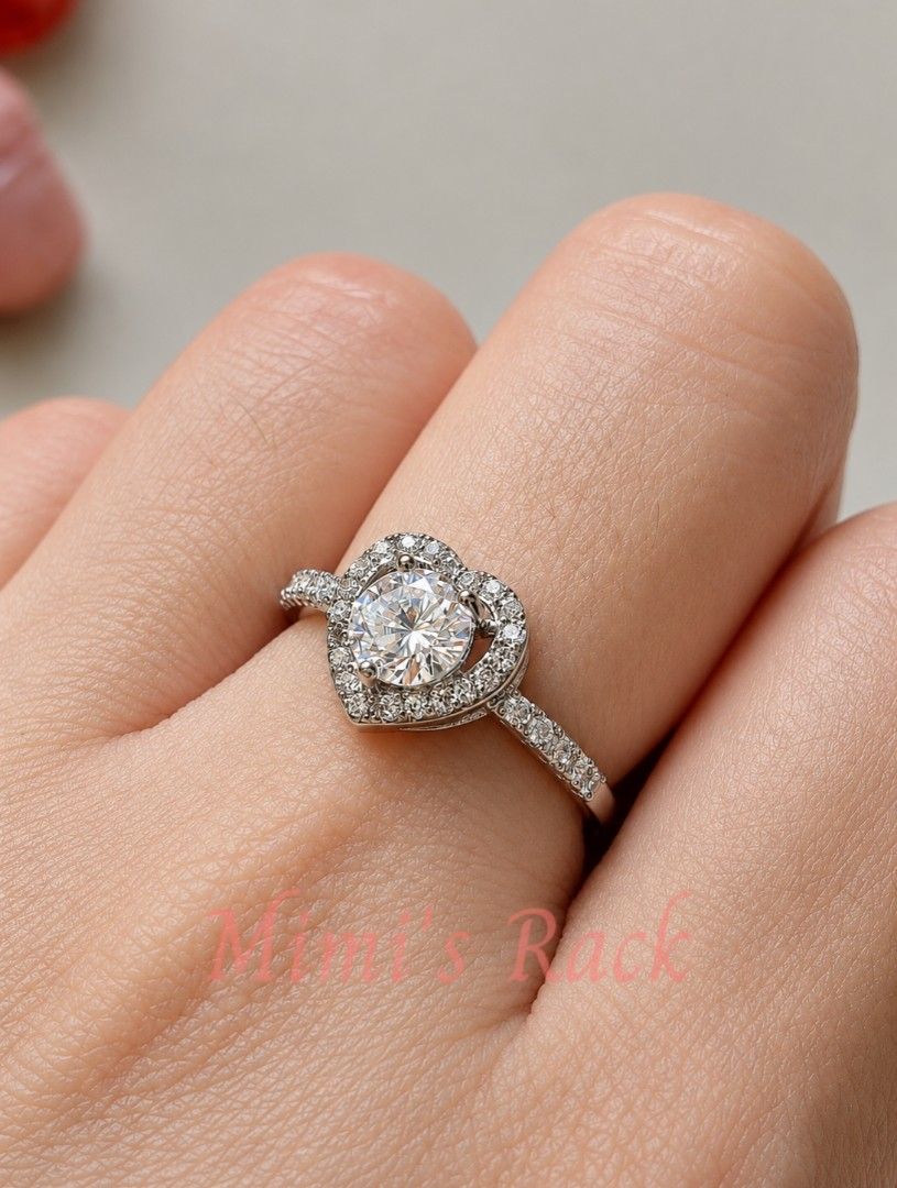 Heart Halo Moissanite Ring (Category: Rings) located in Taguig. Submitted by mimisrack (Listing ID 1468204926, Image 2). Description: 🩶Celebrate love and timeless elegance with this stunning Heart Halo Moissanite Ring. Featuring a brilliant heart-cut moissanite surrounded by a sparkling halo, this ring offers exceptional fire and brilliance that beautifully catches the light. A perfect choice for daily wear, anniversaries, proposals, or as a mea