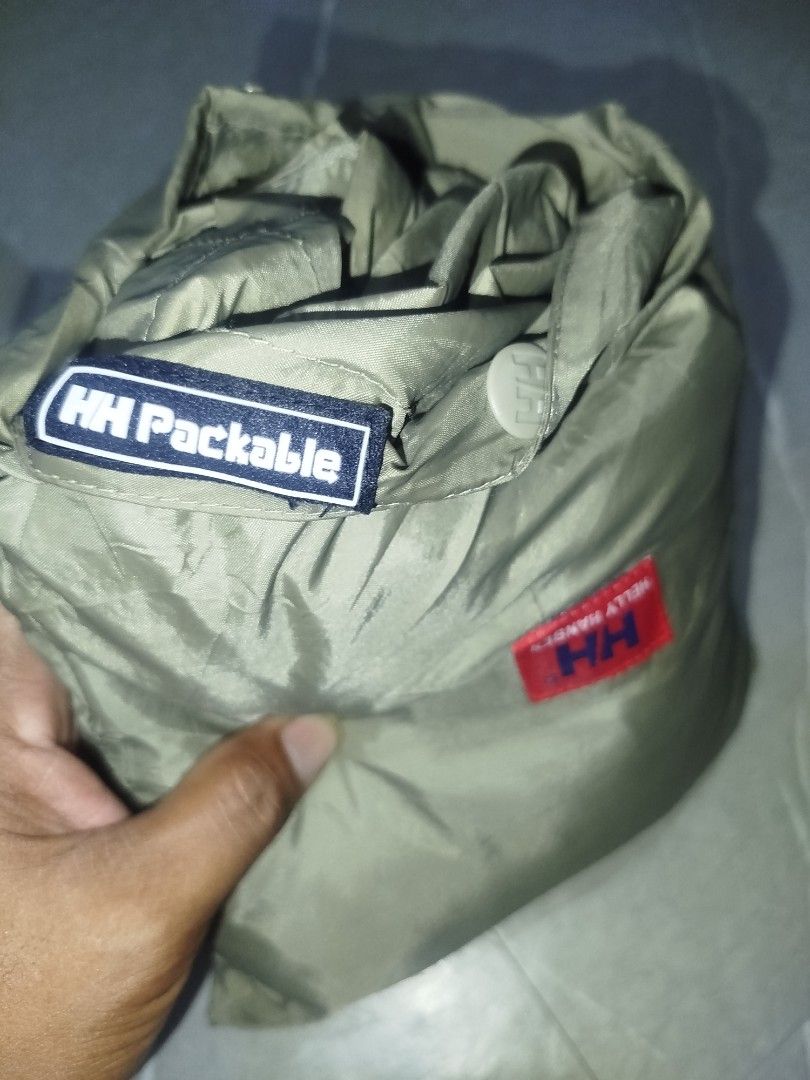 Helly Hansen HH Packable Rain Pants Khaki (Category: Trousers) located in Davao. Submitted by vernoneighty4 (Listing ID 1468156947, Image 2). Description: - Brand: Helly Hansen - Color: Khaki - Material: Lightweight waterproof fabric, ideal for sudden downpours and outdoor hikes - Fit & Features: Comfortable elastic waistband, practical side cargo pocket, and ankle zippers for easy on/off over boots - Portability: Packable design that folds neatl
