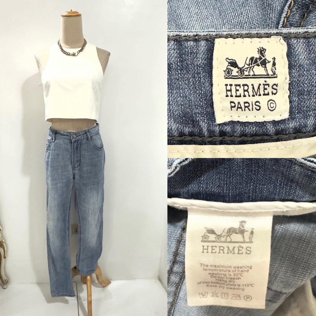 Hermes Denim Blue Jeans (Category: Jeans) located in Bacolod City. Submitted by bhabissagal-05763 (Listing ID 1468140845, Image 3). Description: - Brand: Hermes - Style: Straight leg, mid-rise fit with button fly - Wash: Classic blue wash with light distressing along hems - Details: Branded buttons, front pocket charm, and black leather back waistband label - Material: Comfortable cotton blend denim, perfect for everyday wear - Note: Measurements