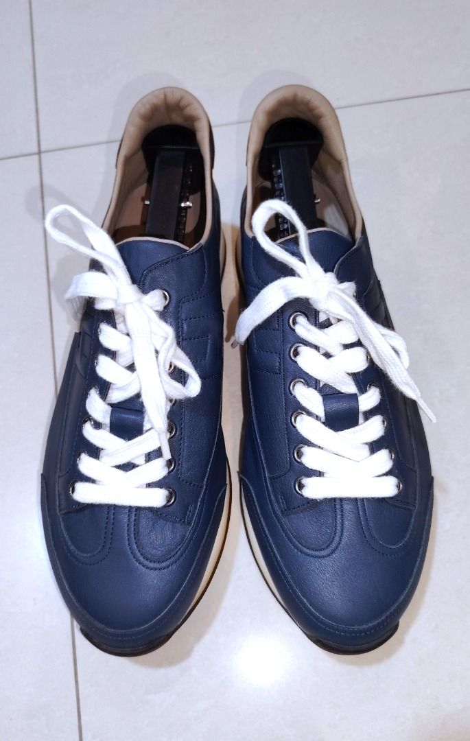 Hermès Quick Leather Sneakers in navy blue (Category: Sneakers & Footwear) located in Bacolor. Submitted by thriftyperminute (Listing ID 1468209709, Image 3). Description: -These are pre-loved or thrifted item so please manage your expectations. -Color may slightly differ due to lighting or with the settings of the device used to view the photos -"Mine" now, pay now policy -Payment through gcash -Sure buyers only, please -No cancellation of order