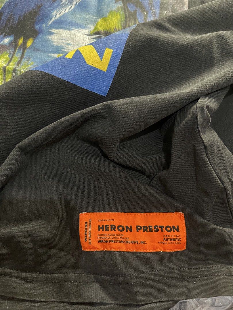Heron preston shirt (Category: Formal Shirts) located in San Jacinto. Submitted by clothcartelph (Listing ID 1468103126, Image 3). Description: HERON PRESTON SIZE: XL DIMES: 22/28 WIDTH: 22 LENGTH: 28 ISSUE: fixed pinhole a COLOR RATE: 8.7/10 CONDITION: VERY GOOD CONDITION .