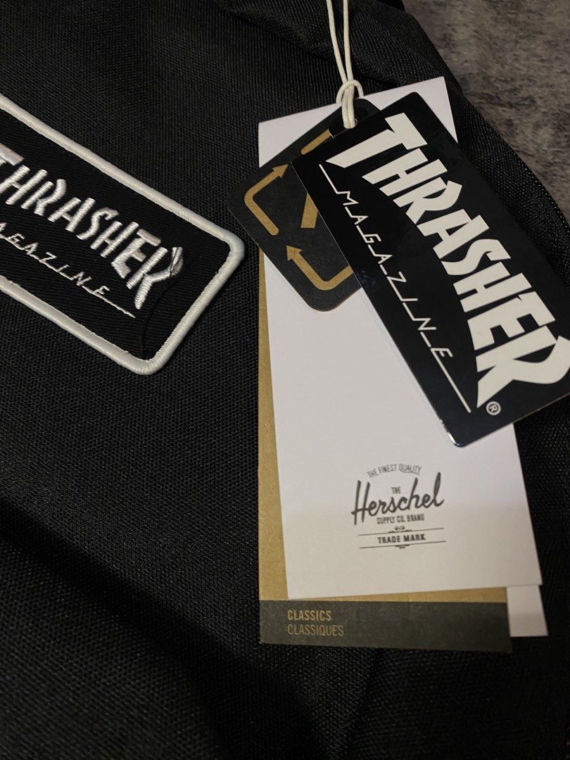 Herschel Supply Co. x Thrasher (Category: Backpacks) located in Manila. Submitted by kiddrevoo (Listing ID 1468159396, Image 3). Description: Herschel Supply Co. x Thrasher Classic XL Backpack in black. This exclusive collab combines Herschel’s classic heritage silhouette with Thrasher Magazine’s iconic skateboarding aesthetic. • Design & Styling: A clean, all-black polyester body accented by a white embroidered Thrasher Magazine logo patch on th