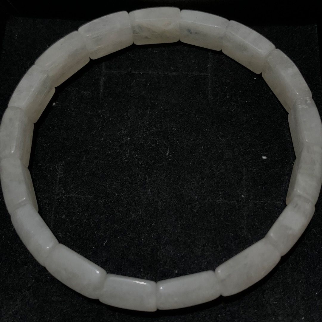 High Quality Natural Moonstone Barrel Bead Bracelet (Category: Bracelets) located in Quezon City. Submitted by itscxyy (Listing ID 1468067064, Image 1). Description: - Material: High quality cylindrical white moonstone beads from Madagascar - Feature: Beautiful blue flashes under light or or direct sunlight - Fit: Stretchy cord that easily fits most wrist sizes.