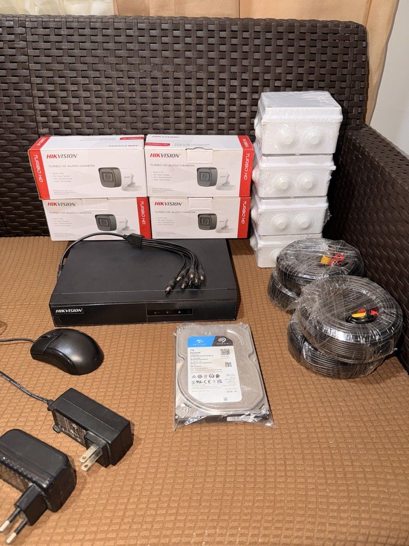 Hikvision 5MP Turbo HD Camera System with DVR and HDD (Category: Security Systems & CCTV Cameras) located in Bacoor. Submitted by ghooost (Listing ID 1468147028, Image 1). Description: - Complete 4-channel CCTV security setup, ideal for home or office - 4x Hikvision 5MP Turbo HD Audio Cameras (DS-2CE16H0T-ITPFS) with built-in mic - Includes DVR unit with mouse and power cables - Comes with 1TB Seagate SkyHawk surveillance hard drive - Includes 4x