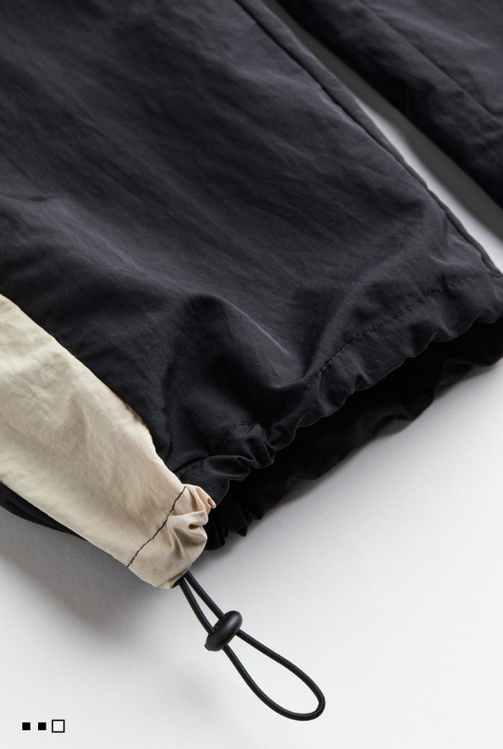 H&M Colorblock Nylon Track Pants with Drawstring Cuffs (Category: Joggers) located in Manila. Submitted by elvmoo (Listing ID 1468201147, Image 3). Description: size xl. brand new. comes with tag pa. rfs: wrong size.