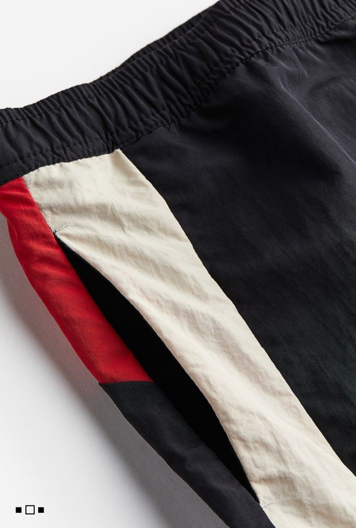 H&M Colorblock Nylon Track Pants with Drawstring Cuffs (Category: Joggers) located in Manila. Submitted by elvmoo (Listing ID 1468201147, Image 2). Description: size xl. brand new. comes with tag pa. rfs: wrong size.