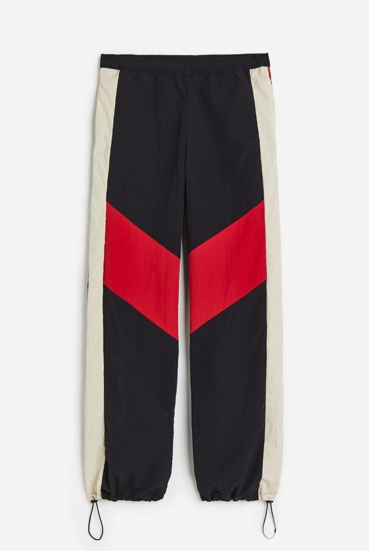 H&M Colorblock Nylon Track Pants with Drawstring Cuffs (Category: Joggers) located in Manila. Submitted by elvmoo (Listing ID 1468201147, Image 1). Description: size xl. brand new. comes with tag pa. rfs: wrong size.
