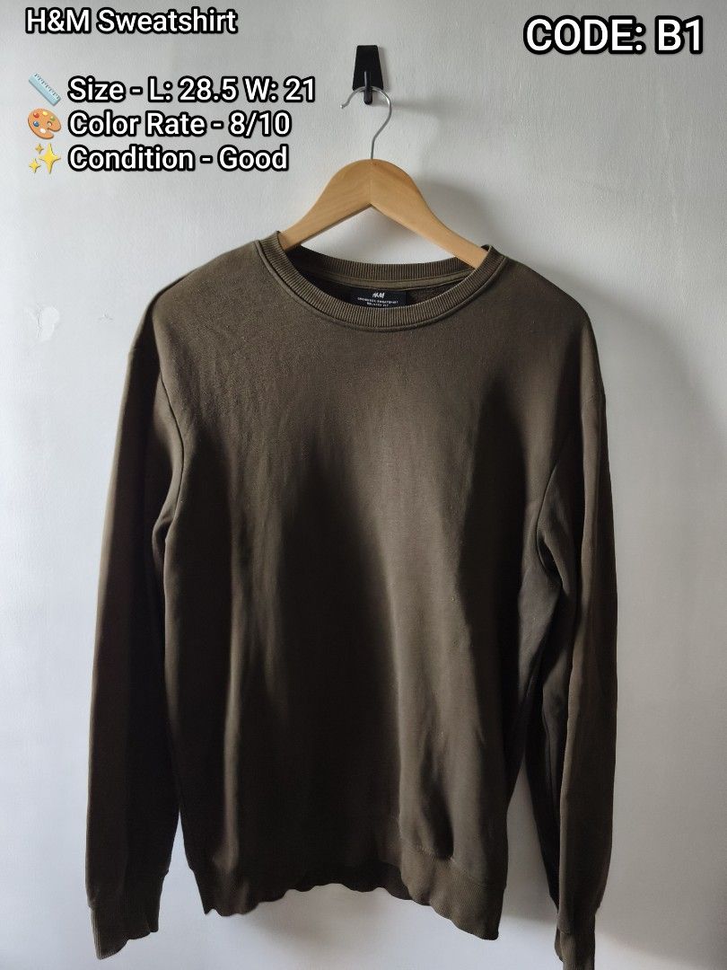 H&M Olive Green Sweatshirt Code B1 (Category: Coats, Jackets and Outerwear) located in Manila. Submitted by gelog2 (Listing ID 1468145984, Image 1). Description: - Brand/Style: H&M classic crewneck sweatshirt - Color: Olive green - Fit: Standard pullover fit for casual daily wear - Features: Long sleeves with ribbed cuffs and hem - Measurements: Length 28.5 inches | Width 21 inches - Item Code: B1.