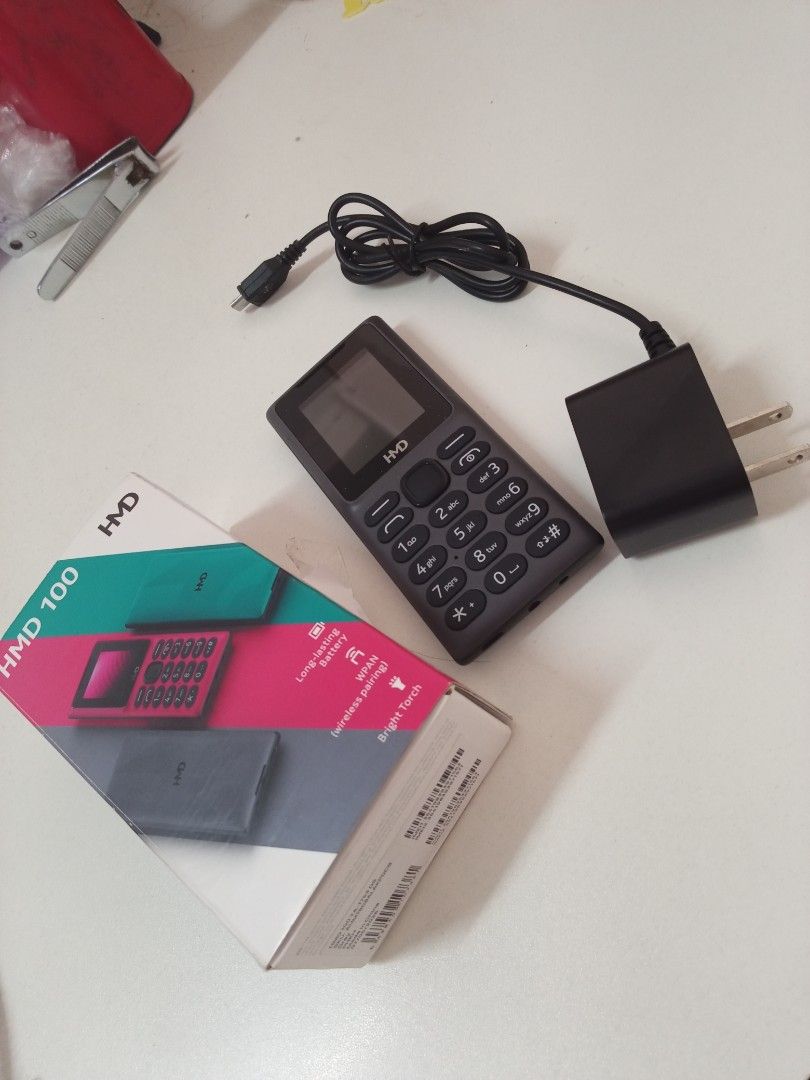 HMD 100 Basic Keypad Phone (Category: Early Generation Mobile Phones) located in Quezon City. Submitted by kryzziesfinds (Listing ID 1468169435, Image 3). Description: Complete with box and charger HMD 100 Basic Keypad Phone 399 pesos only Location: La Loma QC.