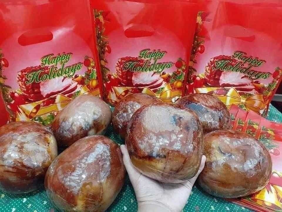 Holiday Ham Ball with Gift Bag (Category: Chilled & Frozen Food) located in Manila. Submitted by shasisante (Listing ID 1468221259, Image 3). Description: LIMITED TIME OFFER. Buy 1 take 1! Buy 1 take 1! Buy 1 take 1! Buy 1 take 1! Round holiday ham ball, comes wrapped in plastic and packed inside a festive red 'Happy Holidays' gift bag. Fully cooked and sliced in one photo to show the inside. Great for family gatherings, noche buena, or holiday f