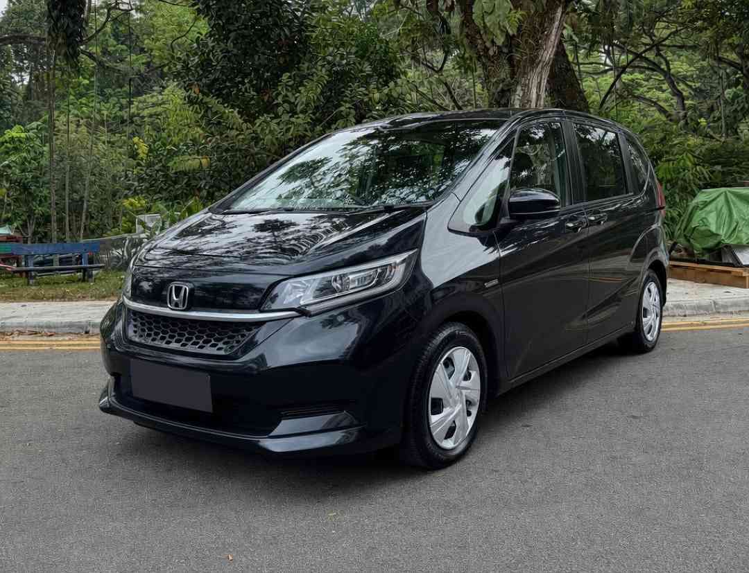 Honda Freed Hybrid 1.5 G Honda Sensing 7-Seater (A) (Category: Used Cars) located in Singapore. Submitted by carousell_certified_partners (Listing ID 1462861316, Image 1). Description: 1 owner! Good condition! 100% full loan available! 100% PHV loan available! Cheapest and lowest depreciation in the market! 1 of only 6 dealers in singapore to be awarded roll of honor by SGCM! Buy with confidence! In-house loan or bank loan available! Fast and eas