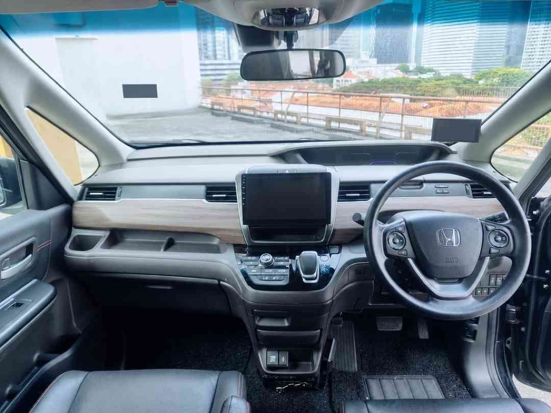 Honda Freed Hybrid 1.5 G Honda Sensing 7-Seater (A) (Category: Used Cars) located in Singapore. Submitted by carousell_certified_partners (Listing ID 1462861316, Image 3). Description: 1 owner! Good condition! 100% full loan available! 100% PHV loan available! Cheapest and lowest depreciation in the market! 1 of only 6 dealers in singapore to be awarded roll of honor by SGCM! Buy with confidence! In-house loan or bank loan available! Fast and eas