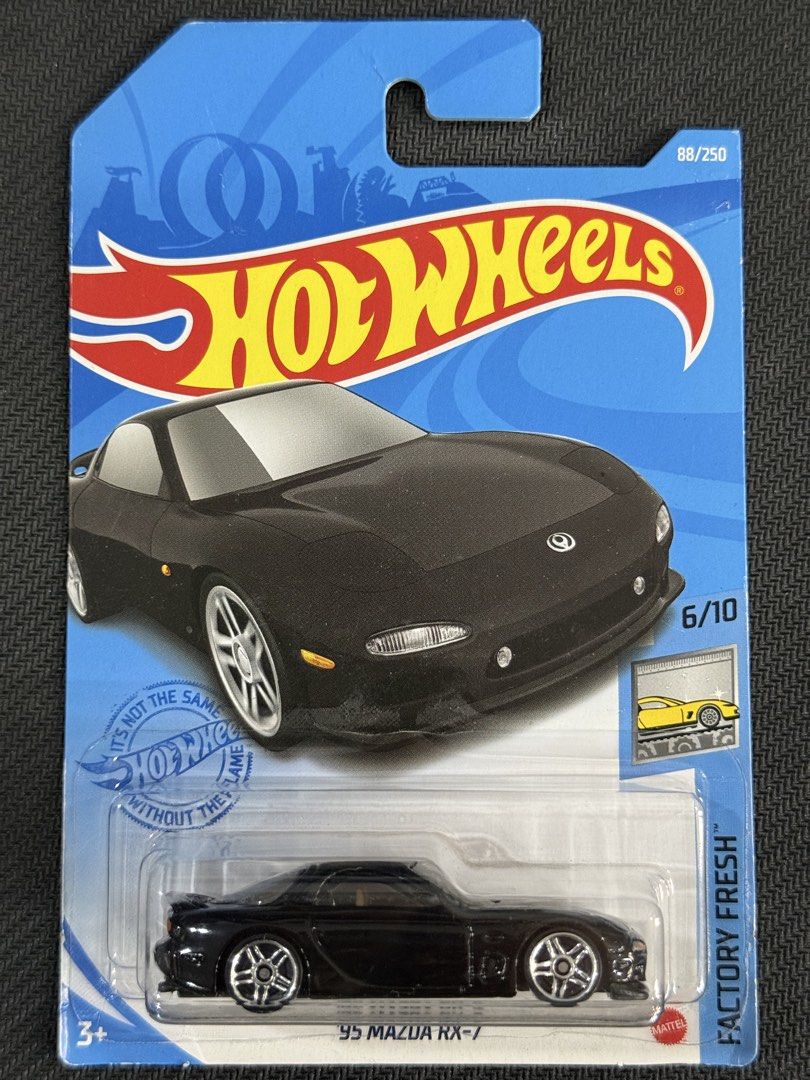 Hot Wheels '95 Mazda RX-7 (Category: Vehicle & Diecast Models) located in Muntinlupa City. Submitted by eman_garcia_ (Listing ID 1468273412, Image 1). Description: - Brand: Hot Wheels - Model: '95 Mazda RX-7 (Factory Fresh Series) - Rarity: 88/250 (Series: 6/10) - Color/Wheels: Glossy Black with Silver Multispoke Wheels - Condition: Brand new, unopened, mint on standard blue and white card.