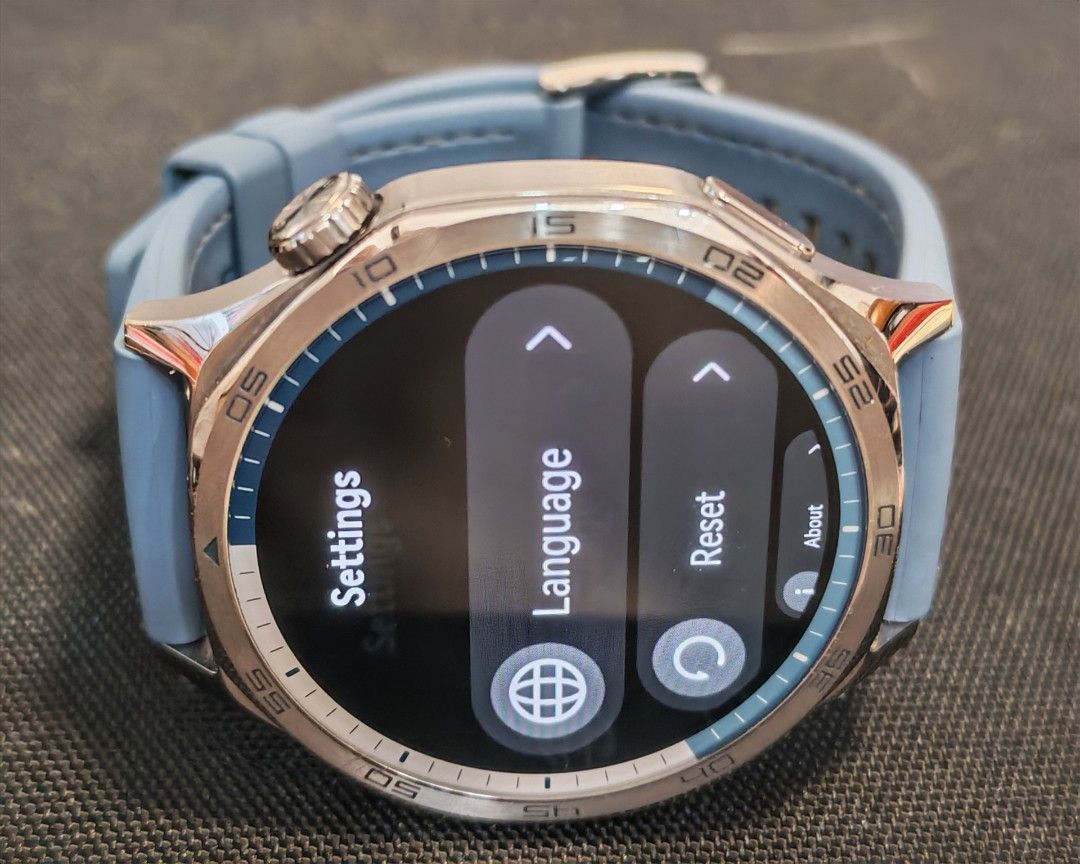 Huawei GT 5 Smartwatch with Blue Strap (Category: Wearables & Smart Watches) located in Quezon City. Submitted by destashingme (Listing ID 1468063003, Image 2). Description: - Model: Huawei Watch GT 5 with silver bezel and textured blue strap - Condition: Fully functional, buttons and rotating crown intact - Battery: Holds charge very well - Inclusions: Original white magnetic charging cable with USB plug - Display: Screen turns on clearly and sh