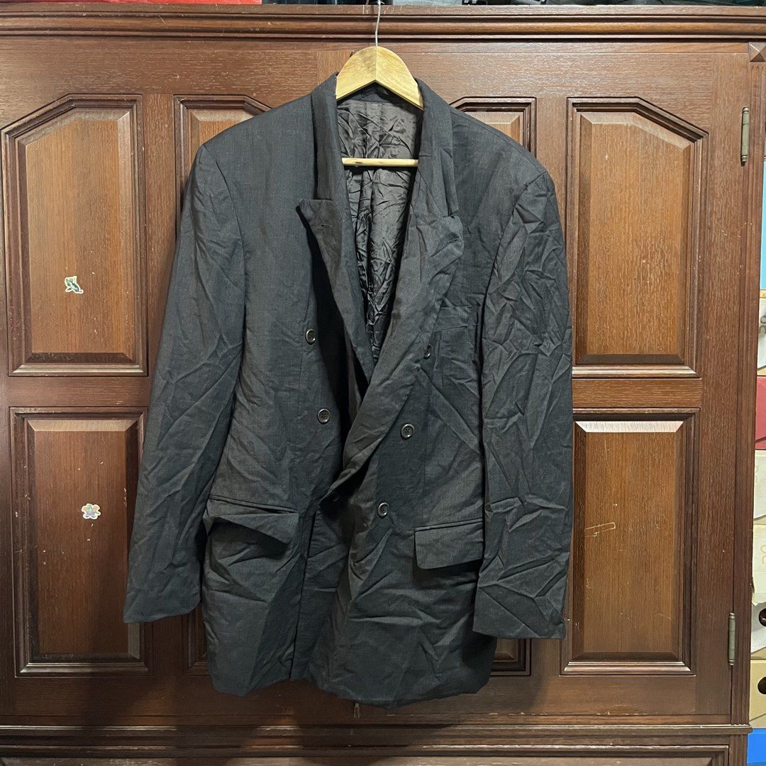 Hugo Boss Double Breasted Wool Blazer Jacket Dark Grey (Category: Coats, Jackets and Outerwear) located in Manila. Submitted by thriftyyyyy. (Listing ID 1468112694, Image 1). Description: - Brand: Hugo Boss - Color: Dark Grey - Material: 100% Pure New Wool - Size: Tag size 52 - Fit: Classic tailored fit - Details: Double-breasted, front button closure, side flap pockets, fully intact interior lining - Condition: Good, needs a steam iron due to st