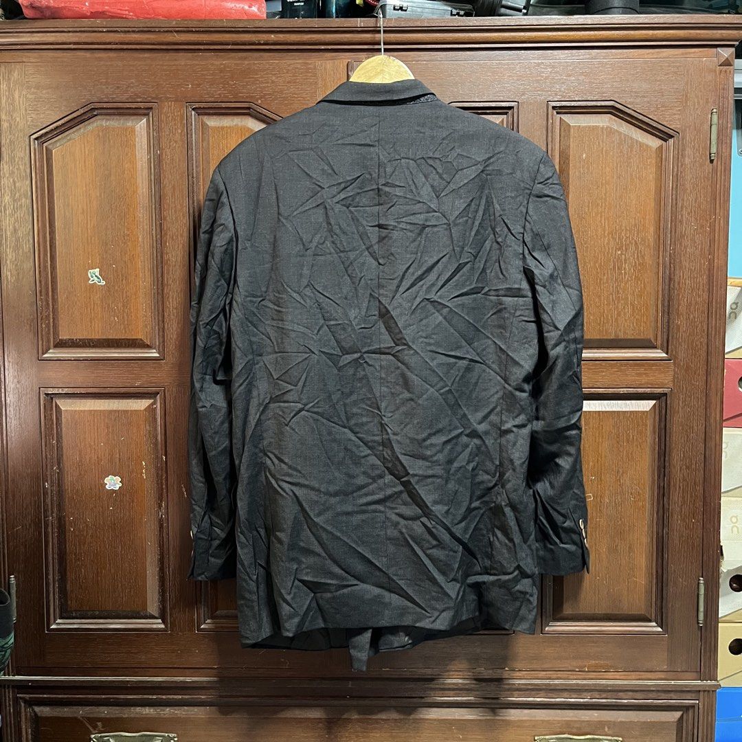 Hugo Boss Double Breasted Wool Blazer Jacket Dark Grey (Category: Coats, Jackets and Outerwear) located in Manila. Submitted by thriftyyyyy. (Listing ID 1468112694, Image 3). Description: - Brand: Hugo Boss - Color: Dark Grey - Material: 100% Pure New Wool - Size: Tag size 52 - Fit: Classic tailored fit - Details: Double-breasted, front button closure, side flap pockets, fully intact interior lining - Condition: Good, needs a steam iron due to st