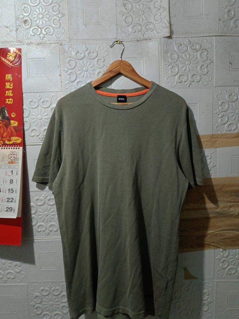 Hugo Boss waffle shirt🤑 (Category: Tshirts & Polo Shirts ) located in Quezon City. Submitted by charlesfab66127 (Listing ID 1468193112, Image 1). Description: Available available!! Hugo Boss waffle shirt🤑 Size on tag: Large👕 Dimes: - 21.5 Width - 30 Length Color rate: 10/10 Condition: 9.8/10 Issue: need wash📌 Loc. Batasan Hills Quezon City 📩📩📩.