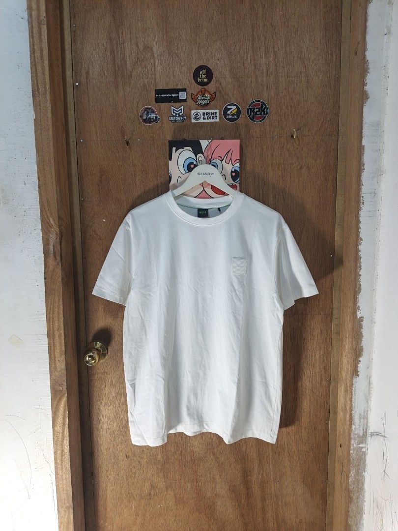 Hugo Boss White Tee Rubberized Chest Logo (Category: Tshirts & Polo Shirts ) located in Nasipit. Submitted by zaynzdrip (Listing ID 1468168453, Image 1). Description: -excellent condition -embossed rubberized logo -authentic -xl on tag - 22 x 27 - dm to purchase & if want more pics and details.