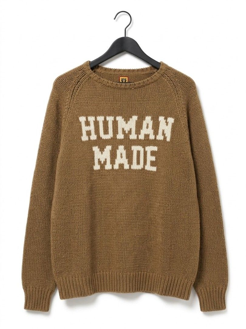Human Made Bunny Knit Sweater Brown (Category: Coats, Jackets and Outerwear) located in Manila. Submitted by shothrift (Listing ID 1468102308, Image 1). Description: - Brand: Human Made (Nigo) - Condition: Brand new / Excellent - Color: Brown - Style: Reversible crew neck knit sweater - Design A: White text branding - Design B: Bunny graphic with yellow text - Details: Ribbed cuffs and hem, thick and warm material - Perfect for: Streetwearfits an