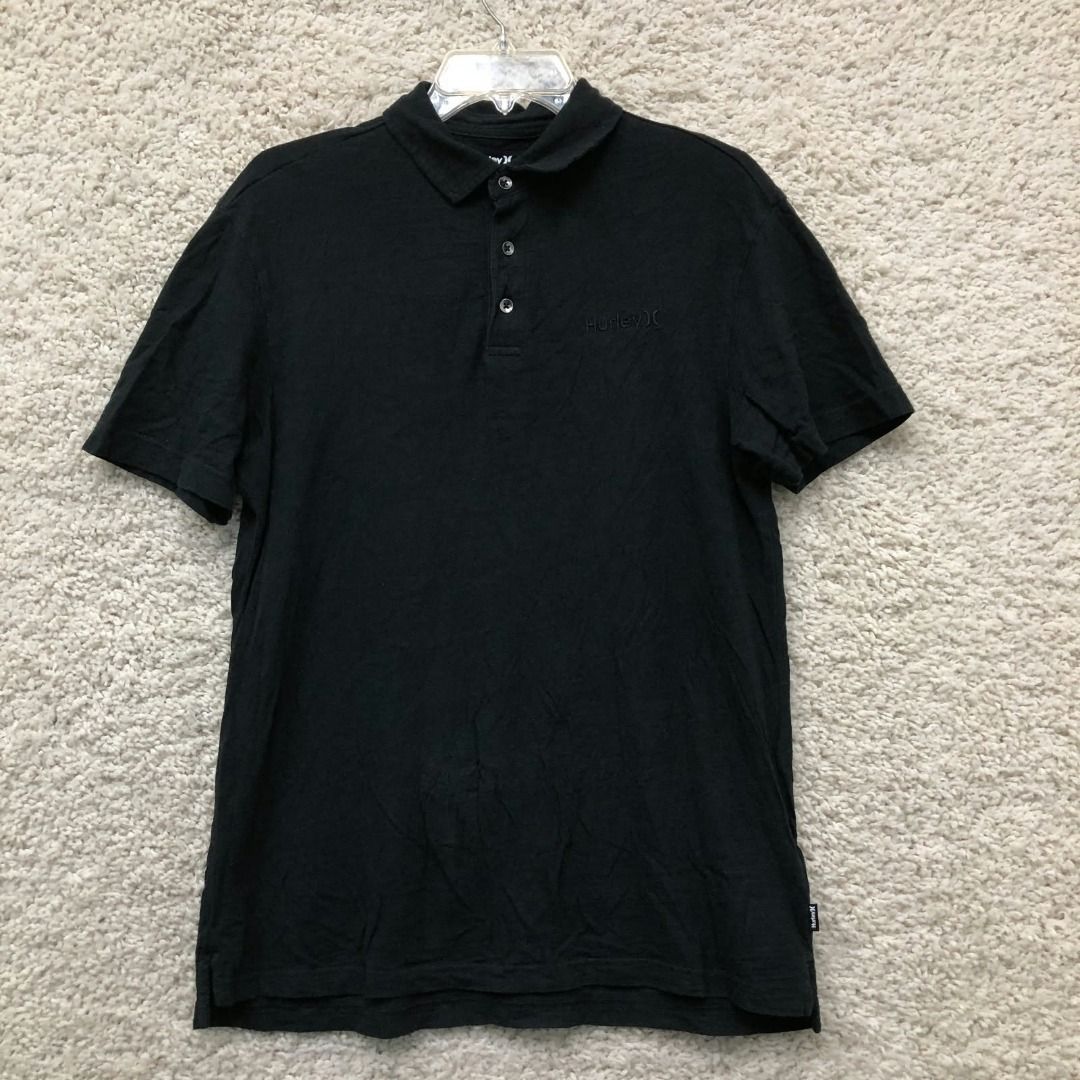 Hurley Black Polo Shirt (Category: Tshirts & Polo Shirts ) located in Roxas City. Submitted by demalatagiboy (Listing ID 1468203372, Image 2). Description: - Brand: Hurley - Color: Classic Black - Material: Soft, breathable cotton - Fit: Standard fit for everyday comfort - Design: Short sleeves, classic collar, 3-button placket - Branding: Subtle tonal Hurley logo embroidered on the left chest - Best for: Casual days, work-from-home, or outdoor o